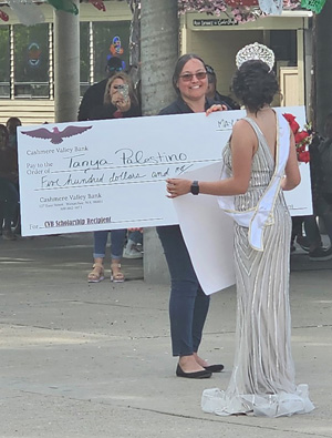 Cashmere Valley Bank presenting a check at the Cinco De Mayo event